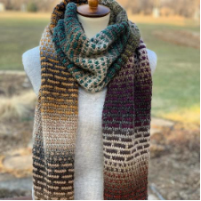 Tunisian crochet wide scarf in two-color brickwork pattern.