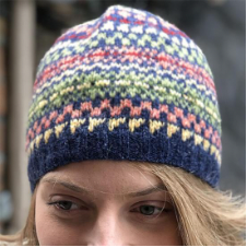 Colorwork beanie with very simple motifs like checks.