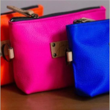 Ultra-bright leather zippered pouches for notions.