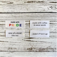 Garment tags. Made with Pride has rainbow colors. Made with coffee & swear words. One of a kind (like me). I didn’t f*ck it up.
