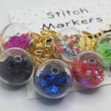 Stitch markers with tiny clear balls full of glitter stars.