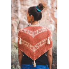 Striped triangular shawl with five chevron bands. Three are solid and the other two have mosaic geometric shapes. Each point is adorned with a tassel.