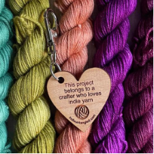 Clip on wooden heart that says, This project belongs to a crafter who loves indie yarn.
