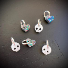 Set of tiny comical skulls and sparkly hearts on stitch markers.