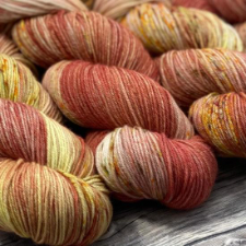 Sunny warm colors in highly variegated skeins.