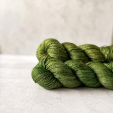Medium slime green yarn with a slight sheen