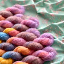Cheerful, variegated alpaca and silk laceweight yarn.
