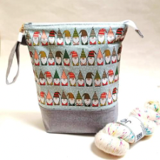 Zippered project bag with rows of cute gnomes.