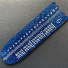 Sock ruler with embedded glitter