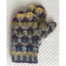 Child’s mittens with colorwork houses.