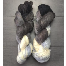 Variegated yarn goes from cream to black.