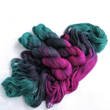 Dark and stormy variegated yarn in three deep, cool shades.