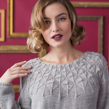 Pullover with diamond textured yoke.