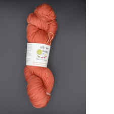 Semi-solid skein of yarn in a deep, warm tone.