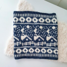 Colorwork cowl with modern shapes of sheep, farm fencing, cottages and the night sky in two colors.