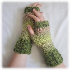 Textured mitts with cabled cuffs.
