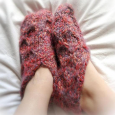 Bulky-knit slippers with honeycomb cables.