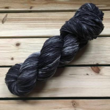 Tonal yarn in deep cool gray.