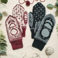Two mitten designs, one depicting an eclipse and the other several phases of the moon.