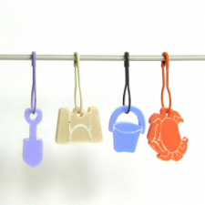 Sand castle, shovel, pale and crab charms on bulb safety pins.