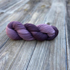 Tonal yarn in almost warm, dusty purples.
