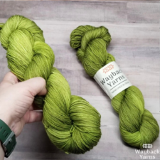 Tonal skeins in medium yellow-green.