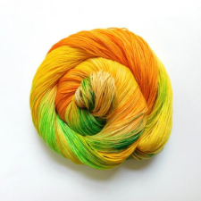 A variegated merino yarn in yellow and orange tones, with flashes of green, yellow and brown.