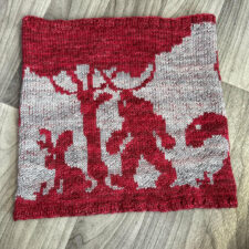 Colorwork cowl shows the Mothman, Nessie, Sasquatch, the Lake Erie Monster, a Jackalope, and another unidentified cryptid.