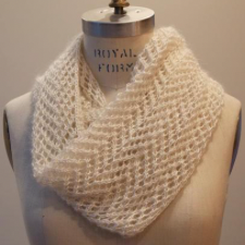 Cowl in mohair with lace in a chevron pattern.