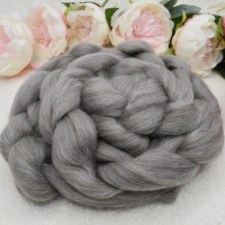 Soft braid of tonal gray top.