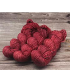 Tonal yarn in deep cool reds.