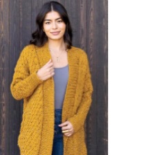 Long, roomy cardigan with wide ribbed button band and cuffs, and honeycomb pattern on body and sleeves.
