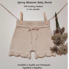 Drawstring shorts with lacy bottom edges.