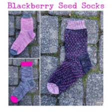 Socks with single-stitch colorwork to look like berry seeds. Contrasting toe and ribbed cuff.