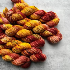 Several skeins in the colors of fall leaves.