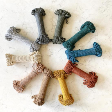 Small bundles of cotton rope in 10 colors from neutral to bold.
