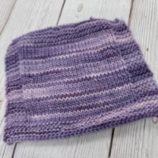 Tonal yarn in dusty medium to light purple.