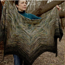 Half-star shawl in ten beveled sections.