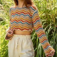 Pullover with long, full sleeves, crocheted in four colors of wavy stripes with openwork.