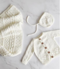 Button-up cardigan, bonnet with strings and baby blanket.