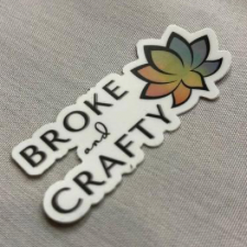 Broke and Crafty logo with multicolor lotus flower.