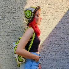 Bucket hat and drawstring backpack made from granny squares with kiwi motifs.