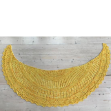 Crescent shawl in sunflower yellow. Textures reflect the textures of a sunflower from the center outward.