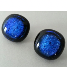 Rounded square buttons are black glass with very bright blue centers.