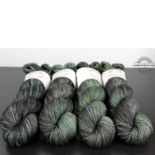 Tonal yarn in medium green with a deep gray overlay.