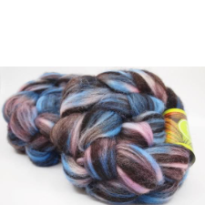 Coiled braid of roving in cool shades, mainly gray with touches of blue and pink.