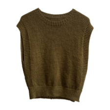 Crew neck, slightly oversize vest with deep armholes and a fitted waist.