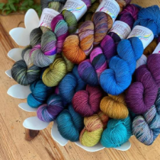 Stack of skeins in variety of colorways.