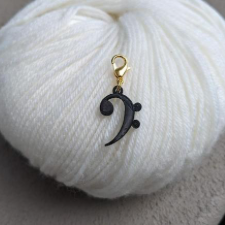 Black musical bass clef, available as progress keeper or stitch marker.