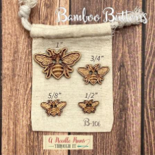 Bee shaped wood buttons in four sizes.
